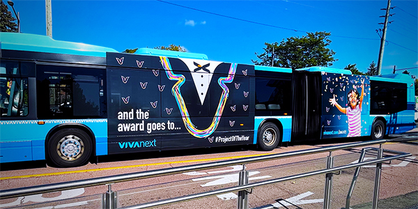 Awards ad showcased on the the side of a Viva bus.